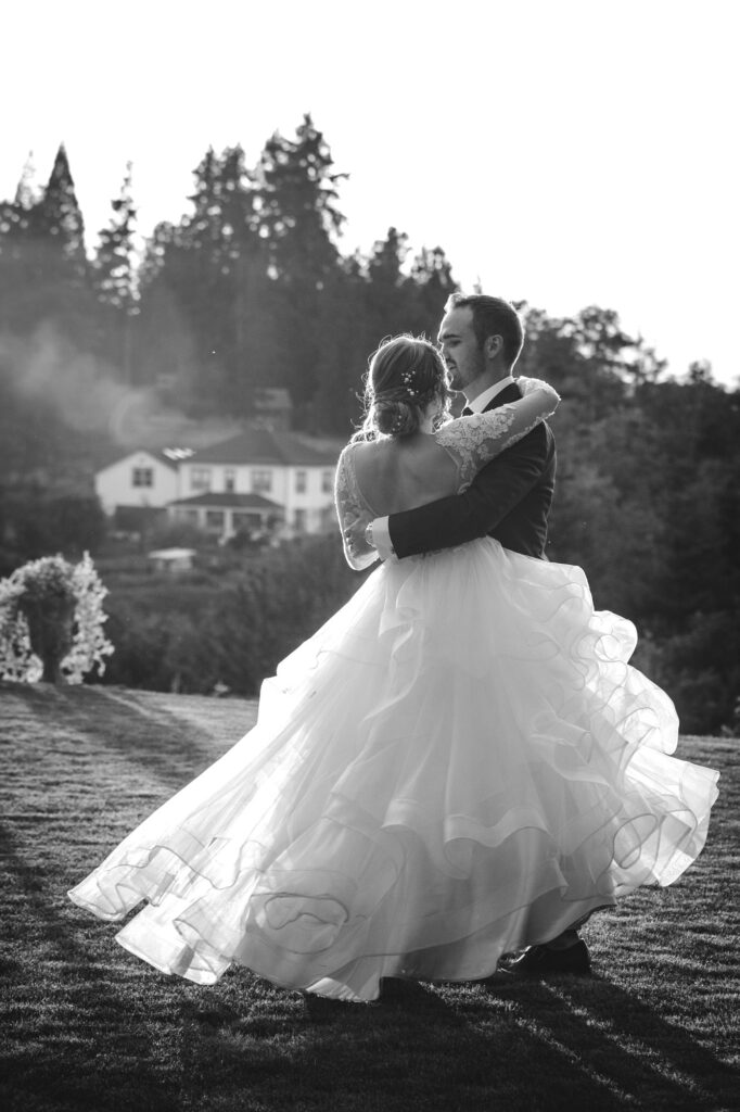 The beautiful wedding dress sways while first dance at a Boulder wedding — Best Wedding photography and Cinematography The beautiful wedding dress sways while first dance at a Boulder wedding — Best Wedding photography and Cinematography